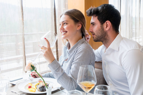 Couple having lunch at rustic gourmet restaurant - Foto, Imagen