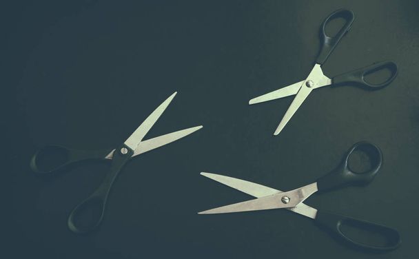 Stationery scissors on a dark background - Fotoğraf, Görsel