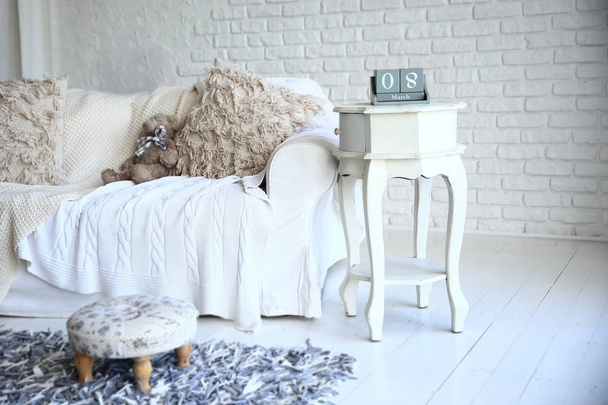 white sofa and nightstand with changeover calendar in a stylish living room - Φωτογραφία, εικόνα