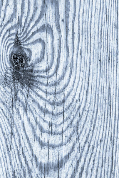 Oude verweerde rotte gebarsten geknoopte blauw gekleurd en gelakt grenen planken schilferige Grunge Texture Detail - Foto, afbeelding