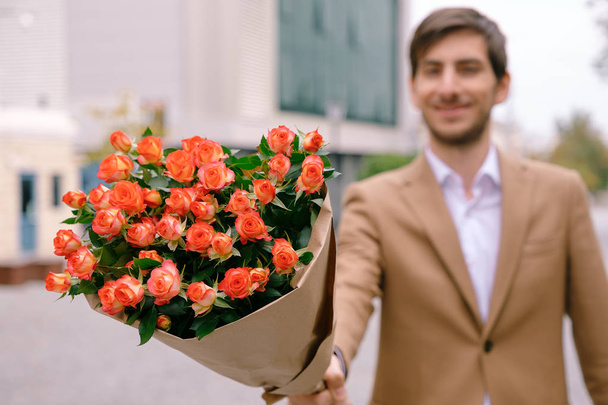 Flower delivery concept. Focus on bouquet of flowers - Photo, image