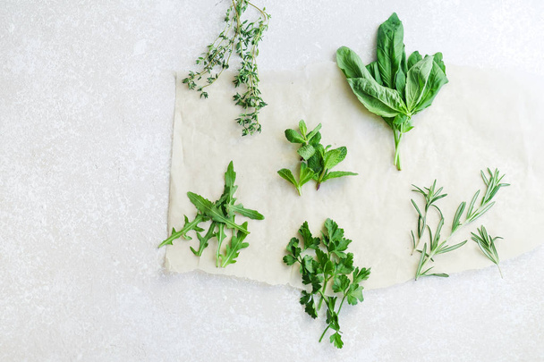 collection of rosemary and thyme with mint and arugula with basil and parsley herbs isolated on white background, close-up  - Photo, image