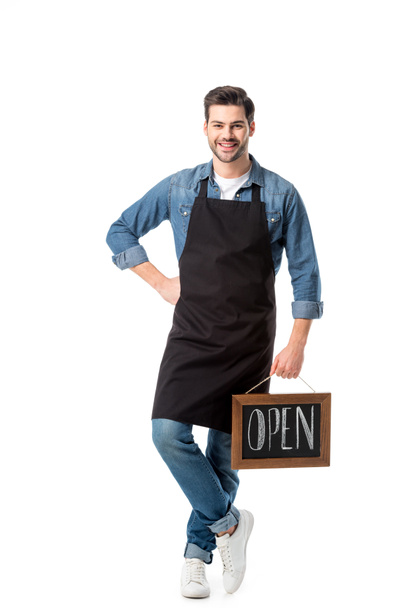 uśmiechnięty młody kelner z otwarta tablica na białym tle - Zdjęcie, obraz