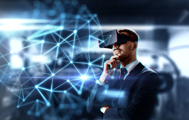 businessman with virtual headset and network - Foto, immagini