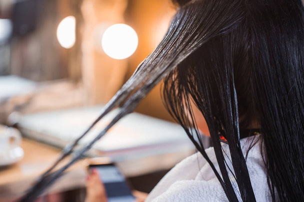 Hair care in modern spa salon. Close up of beautiful woman hair - Valokuva, kuva