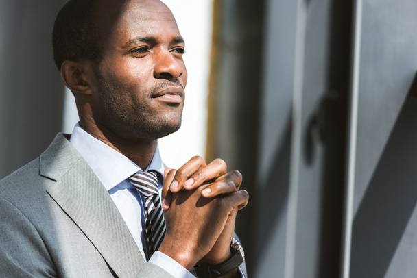 portrait of handsome young african american businessman looking away - Foto, Imagem