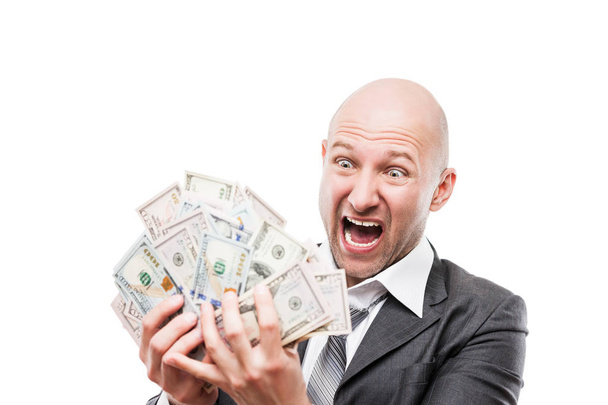 Businessman in black suit hand holding US dollar currency money - Fotografie, Obrázek