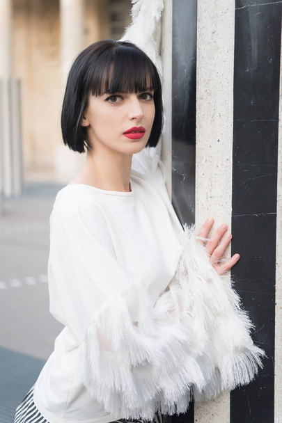 Sensual woman with red lips makeup in paris, france. Woman with brunette hair in white blouse. Beauty girl with fashion look. Fashion model with glamour style. Beauty fashion and look - Фото, зображення