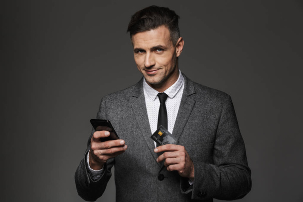 Photo of business man in formal clothing paying online with cell - Foto, Imagem