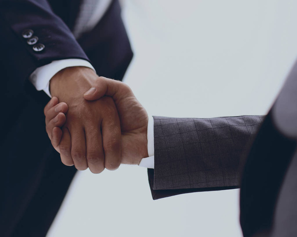 Closeup of a business handshake - Foto, afbeelding