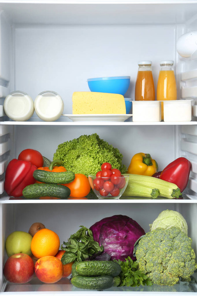 Open fridge full of vegetables and fruits - Fotografie, Obrázek