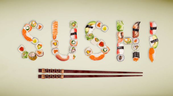 Traditional japanese sushi pieces making inscription. - Φωτογραφία, εικόνα