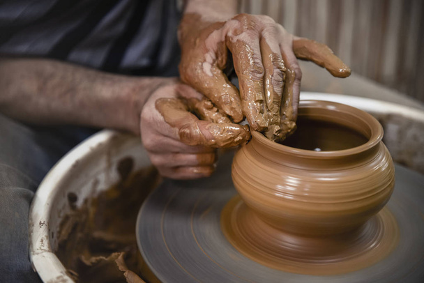 A day in the life of a pottery artist - at the pottery wheel. - Valokuva, kuva