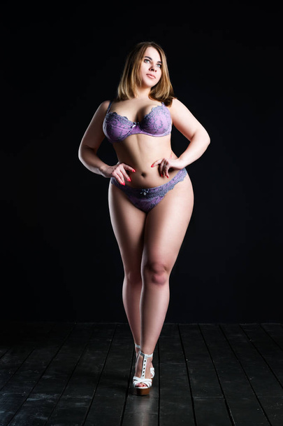 Plus size sexy model in lingerie, fat woman on black studio background, overweight female body - Photo, Image