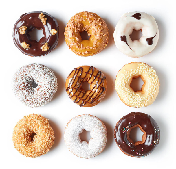 Erilaisia donitseja eristetty valkoinen, ylhäältä
 - Valokuva, kuva