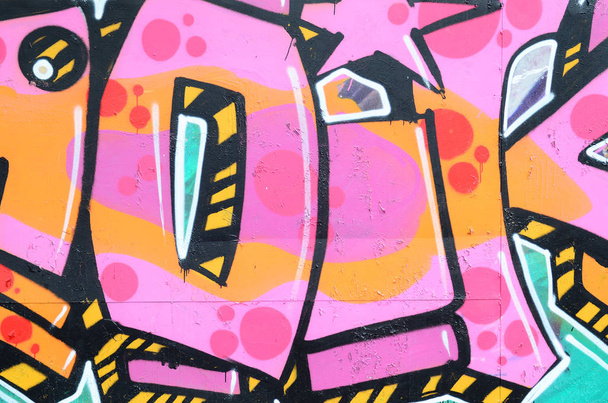 Fragmento de un hermoso patrón de graffiti en rosa y verde con un contorno negro. Arte callejero imagen de fondo
 - Foto, Imagen