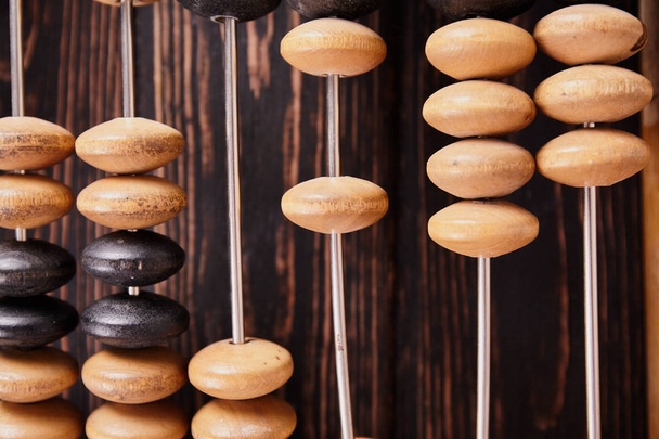 Vintage abacus on wooden background - Foto, immagini