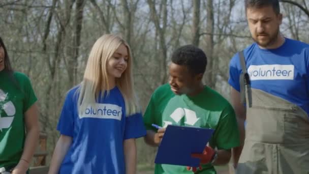 Cheerful diverse team of volunteers - Footage, Video