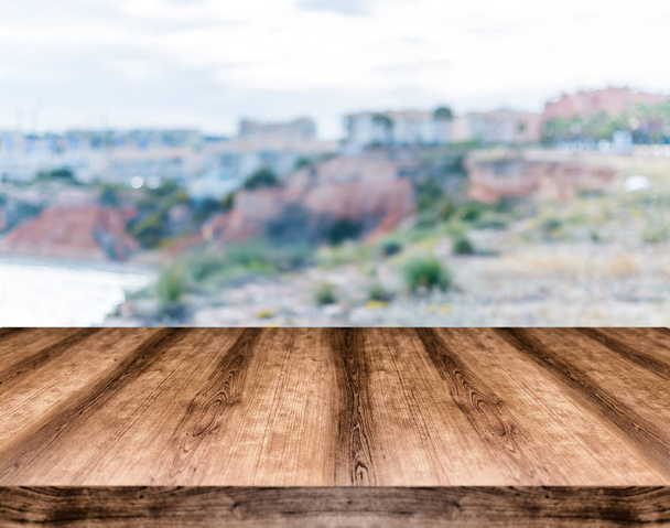 Wooden empty table board in front of blurred background. Can be used for display or montage any product. Mock up for display your product. - Photo, Image