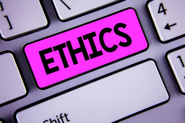 Conceptual hand writing showing Ethics. Business photo showcasing Maintaining equality balance among others having moral principles written on Key Button on Keyboard with copy space. Top view. - Photo, Image