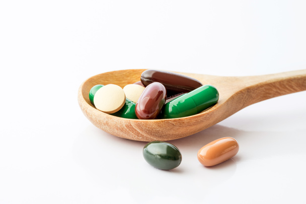 Primer plano suplemento mixto y medicamento vitamínico para la salud médicacoche
 - Foto, Imagen