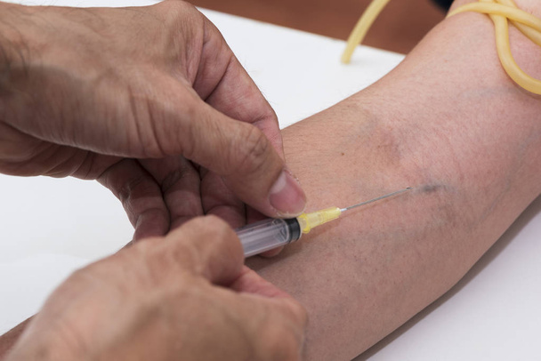 Preparing blood drawn from the arm - Photo, Image
