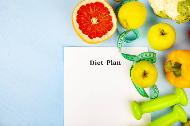 Food and sheet of paper with a diet plan  - 写真・画像