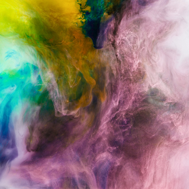 creative texture with pink, orange and green flowing paint, looks like space - Foto, immagini