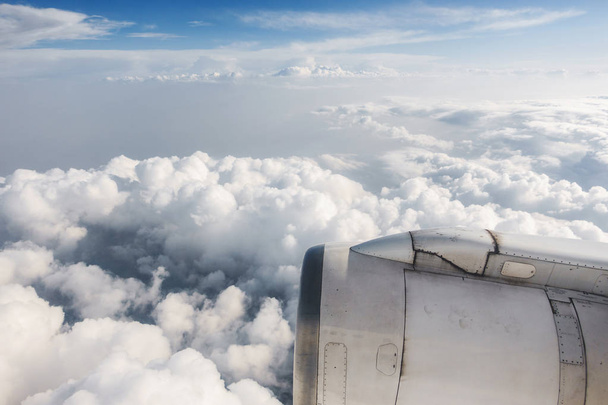 Airliner jet engine and cloudy sky - Photo, Image