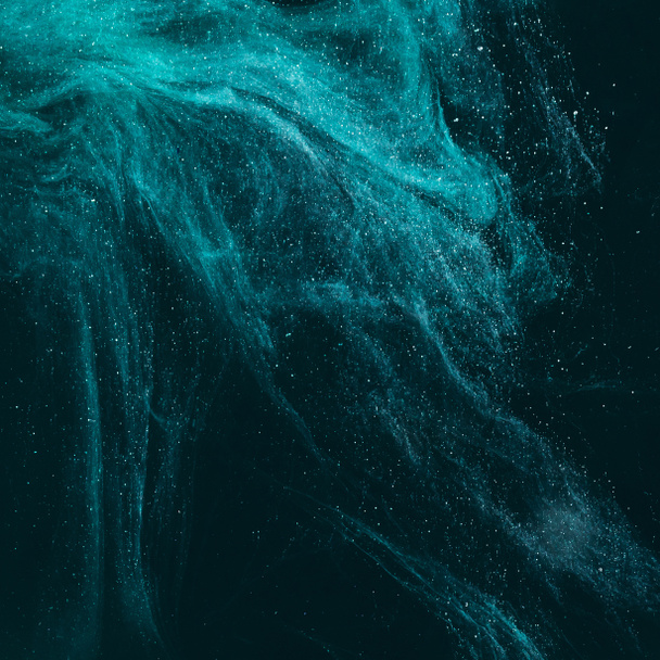 texture artistique magique avec peinture turquoise sur noir
  - Photo, image