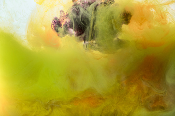 artistic background with flowing yellow, orange and purple paint  - Zdjęcie, obraz
