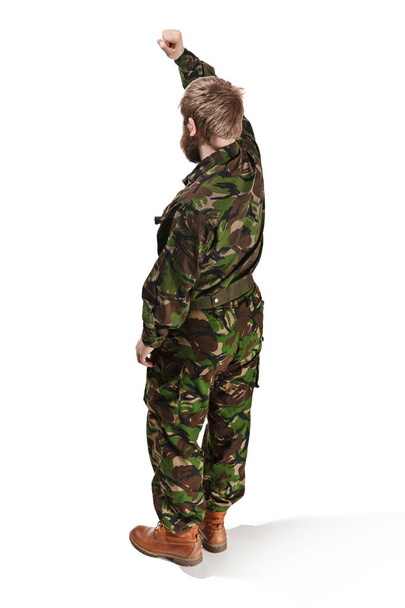 Young army soldier wearing camouflage uniform isolated on white - Foto, immagini