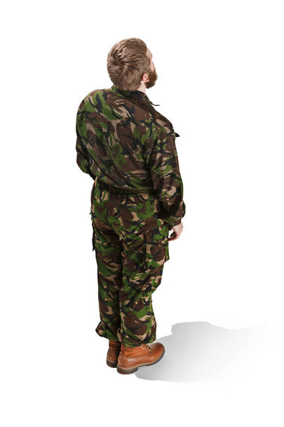 Young army soldier wearing camouflage uniform isolated on white - Fotografie, Obrázek