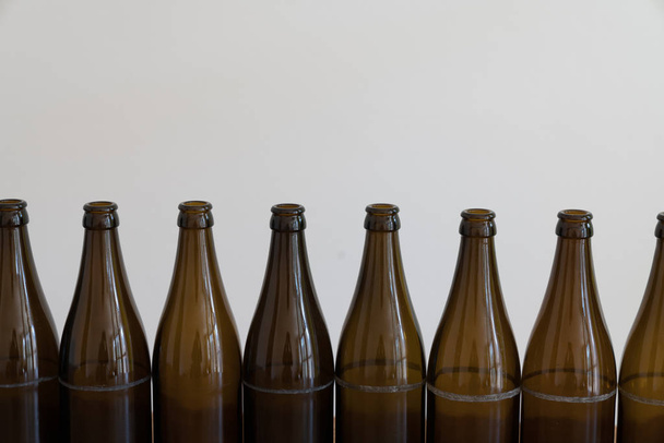 close up of empty brown beer bottles and plenty of copy space - Photo, Image