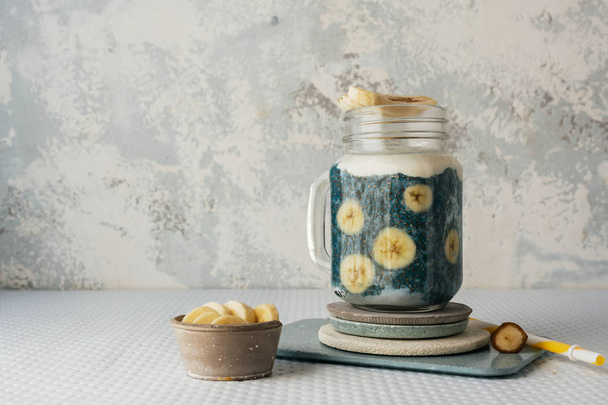 Chia smoothie, with fresh platanos and coconut and blueberries m - Photo, image