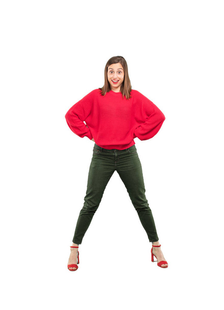 Young pretty woman surprised. Full body cutout person against white background. - Foto, afbeelding