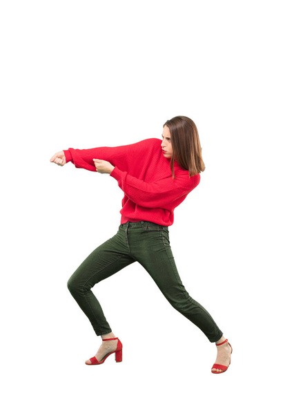 Young pretty woman pulling sign with an empty copyspace to place your concept. Full body cutout person against white background. - Foto, immagini