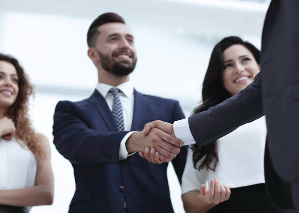 handshake business partners at a meeting - Fotó, kép