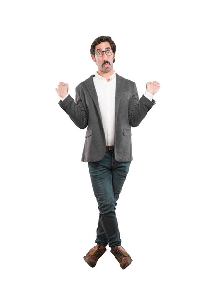 Young crazy man with confused or doubting expression. Full body cutout person against white background. - Foto, Imagem