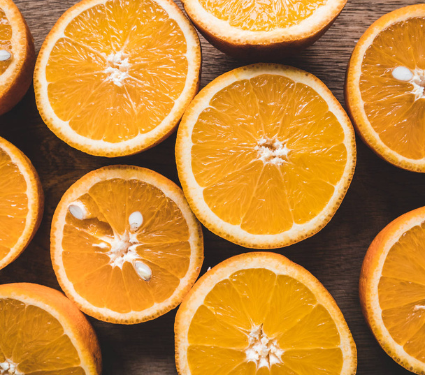 Closeup of sliced oranges - Фото, изображение