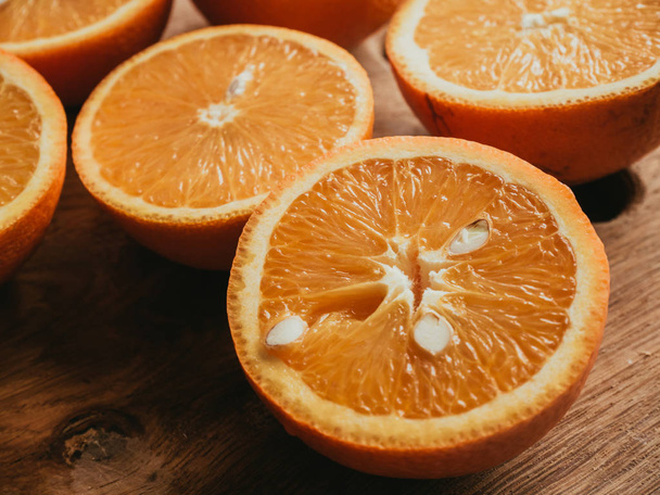 Closeup of sliced oranges - Фото, изображение