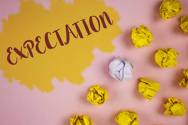 Word writing text Expectation. Business concept for Meteorological research analyst predicts weather forecast written on Painted background Crumpled Paper Balls next to it. - Photo, Image