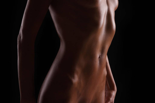 красиве струнке спортивне жіноче тіло
 - Фото, зображення
