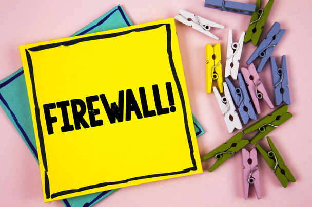 Text sign showing Firewall Motivational Call. Conceptual photo Malware protection prevents internet frauds written on Sticky Note Paper on plain background Paper Balls and Wooden Clips. - Photo, Image