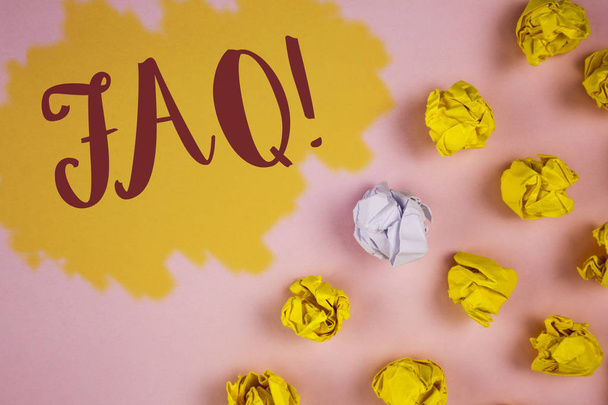 Word writing text Faq Motivational Call. Business concept for Frequently asked question for clearing up confusions written on Painted background Crumpled Paper Balls next to it. - Photo, Image