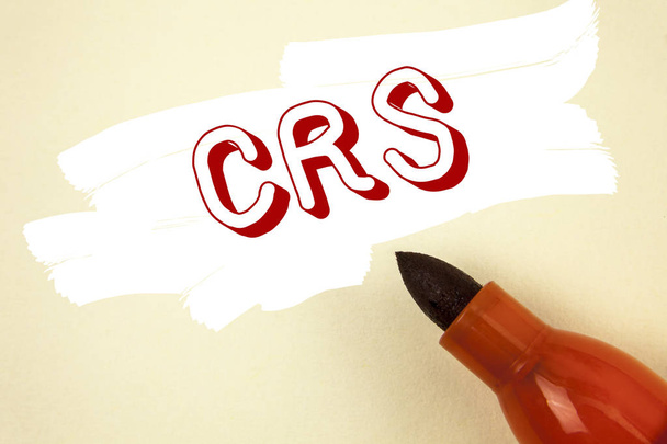 Handwriting text writing Crs. Concept meaning Common reporting standard for sharing tax financial information written on Painted background Marker next to it. - Φωτογραφία, εικόνα