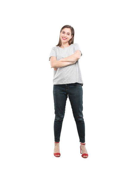 Young pretty woman in proud pose. Full body cutout person against white background. - Fotó, kép