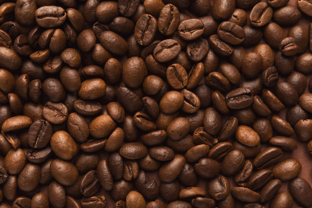 Closeup of coffee seeds, textured background - Foto, immagini