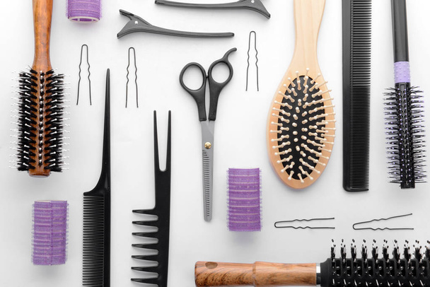 Professional hairdresser's set on white background, top view - Photo, Image