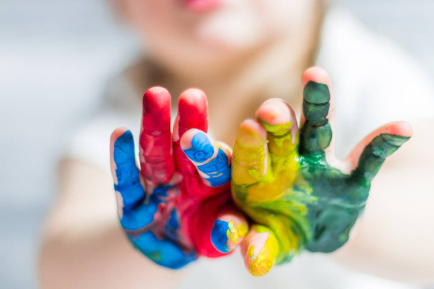 Children hands in colors - 写真・画像